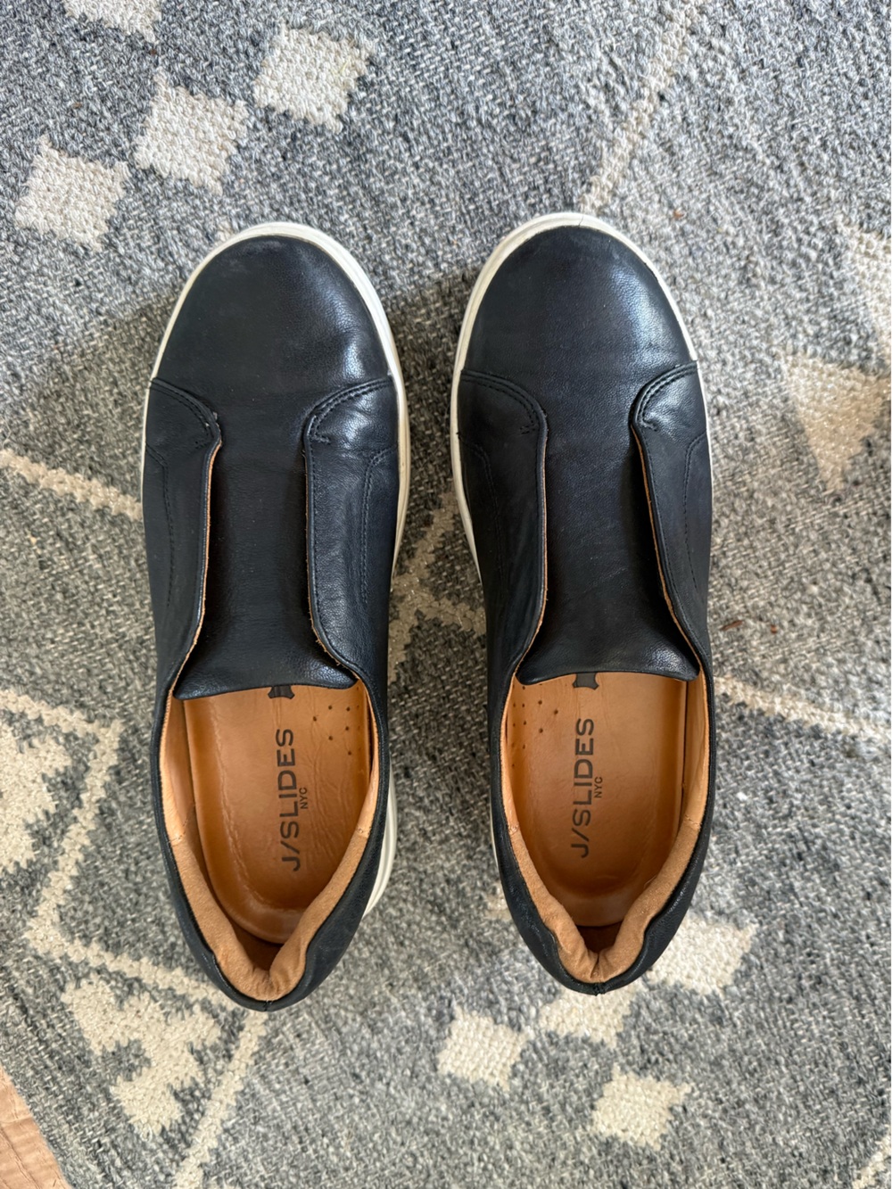 J/SLIDES Black Leather Slip-On Loafers with Tan Insole